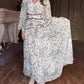 Elegant dress with printed waist and V-neck