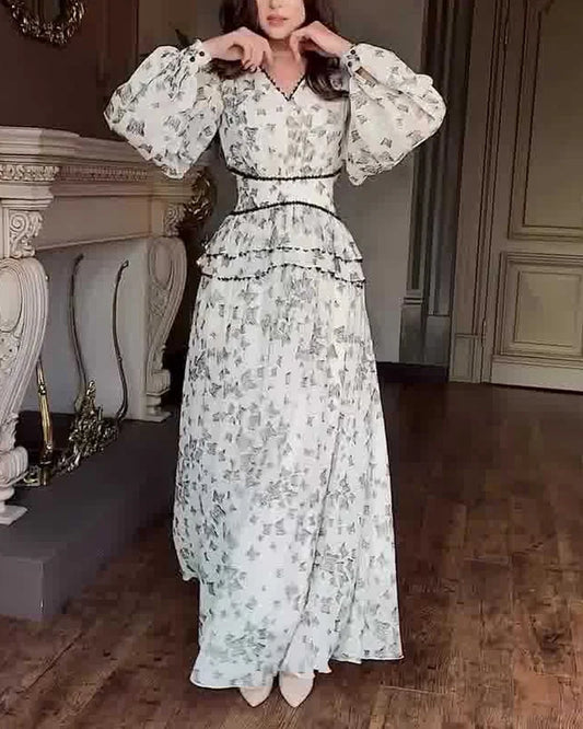 Elegant dress with printed waist and V-neck