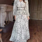 Elegant dress with printed waist and V-neck