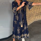 Weit geschnittenes Vintage-Kleid mit V-Ausschnitt
