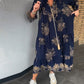 Weit geschnittenes Vintage-Kleid mit V-Ausschnitt