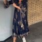 Weit geschnittenes Vintage-Kleid mit V-Ausschnitt