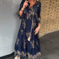 Weit geschnittenes Vintage-Kleid mit V-Ausschnitt