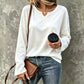 Maglia casual da donna con scollo a V e maniche lunghe