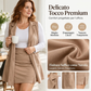 Set composto da gilet lungo da donna con rever e apertura frontale, e minigonna